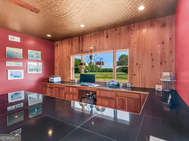 a view of a hallway with windows