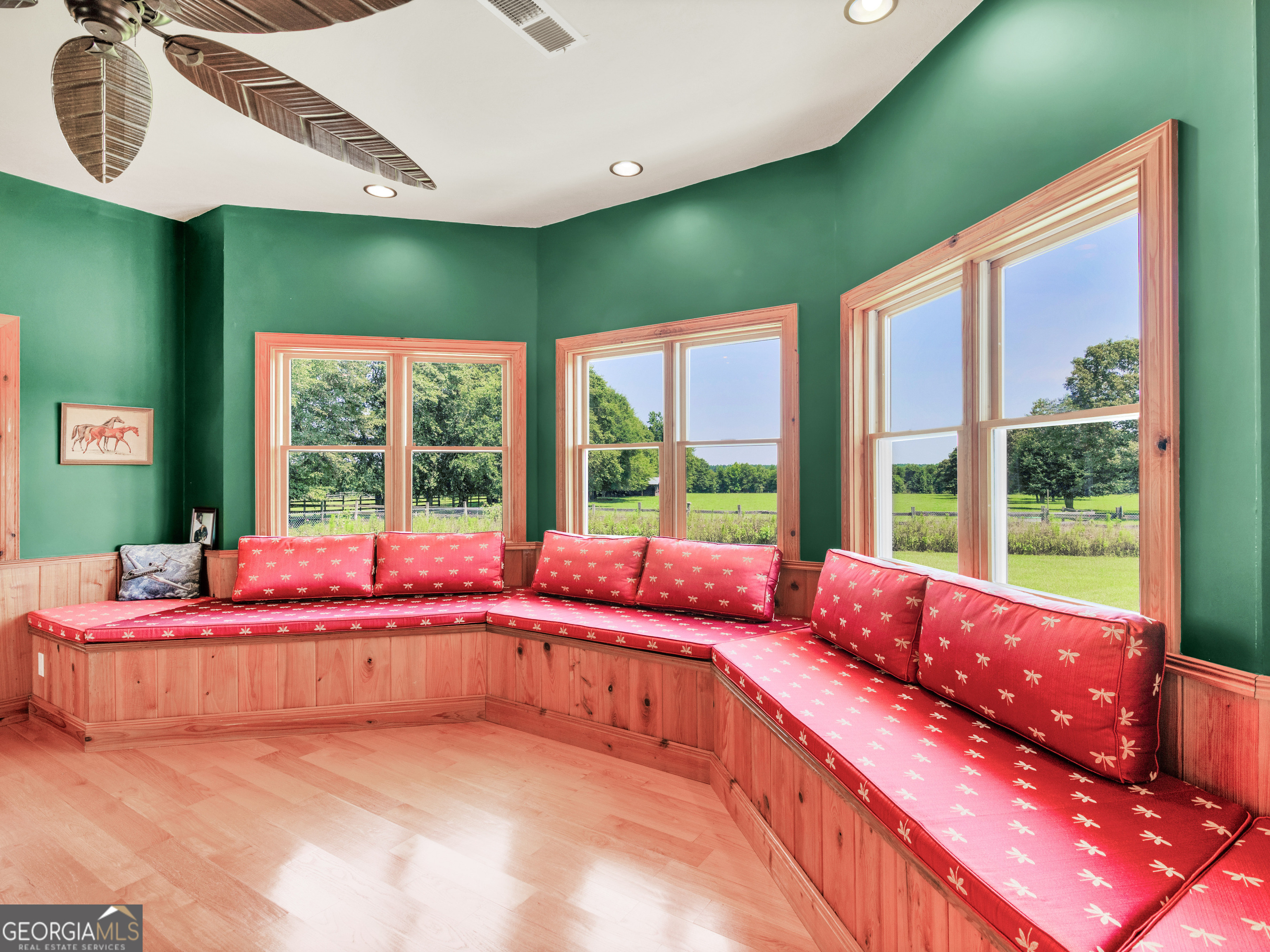 2051 Gough Road Louisville, GA 30434 - Photo 40 of 95 a living room with a large bed and a large window