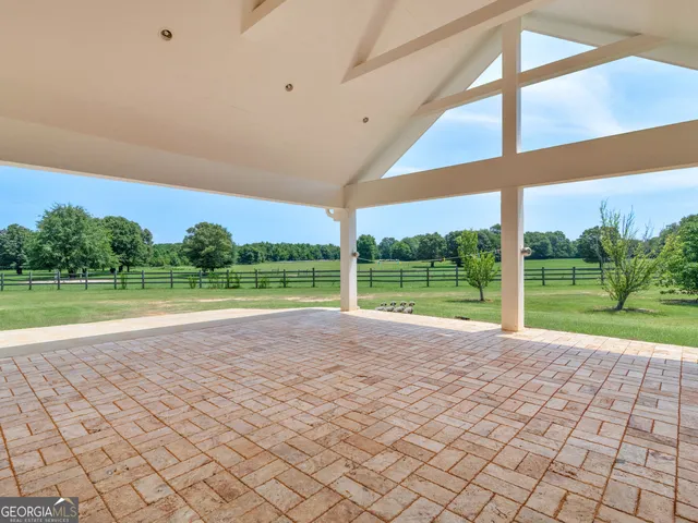 a view of a house with a big yard