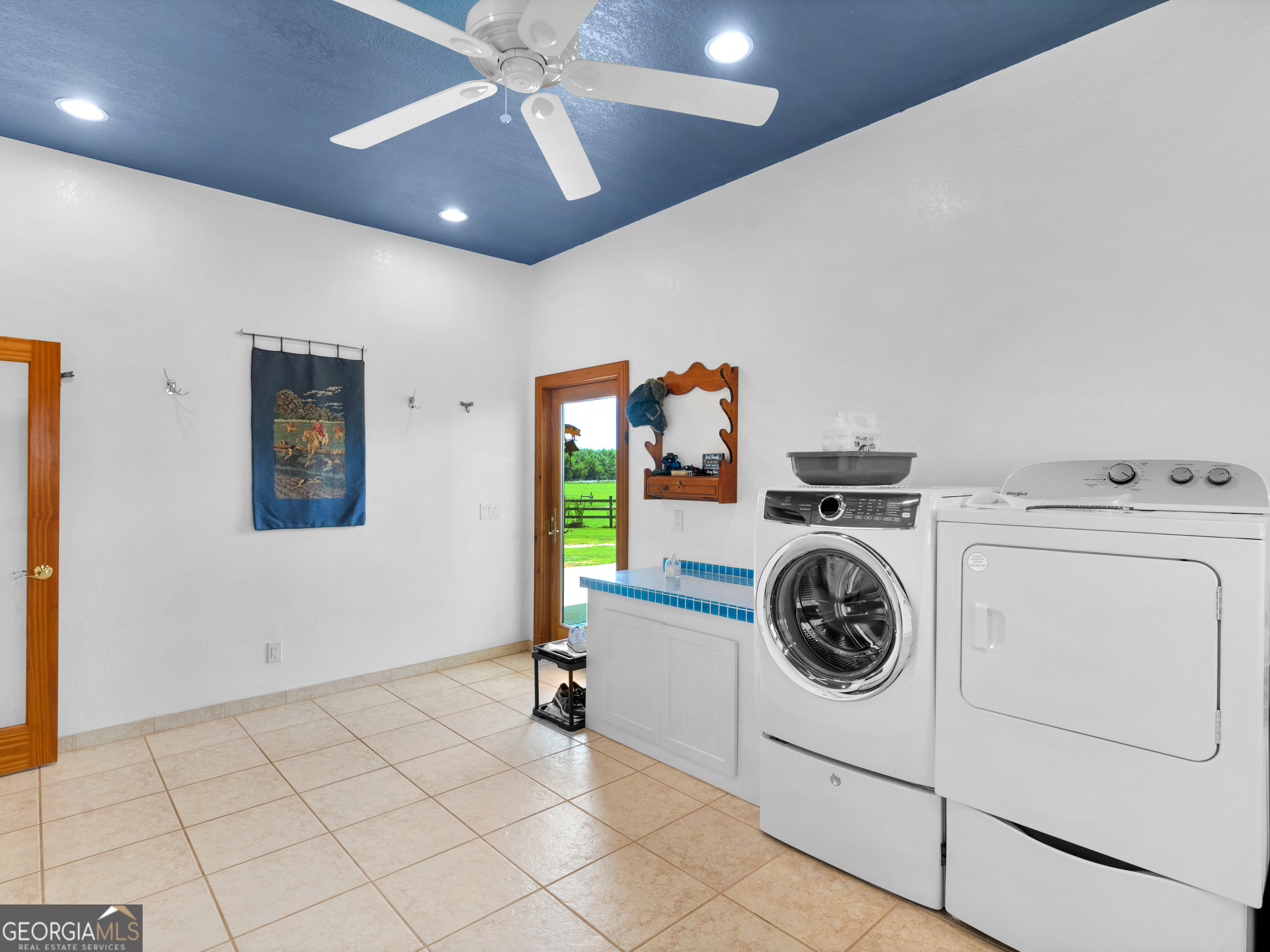 2051 Gough Road Louisville, GA 30434 - Photo 48 of 95 a view of a storage & utility room with a washer dryer