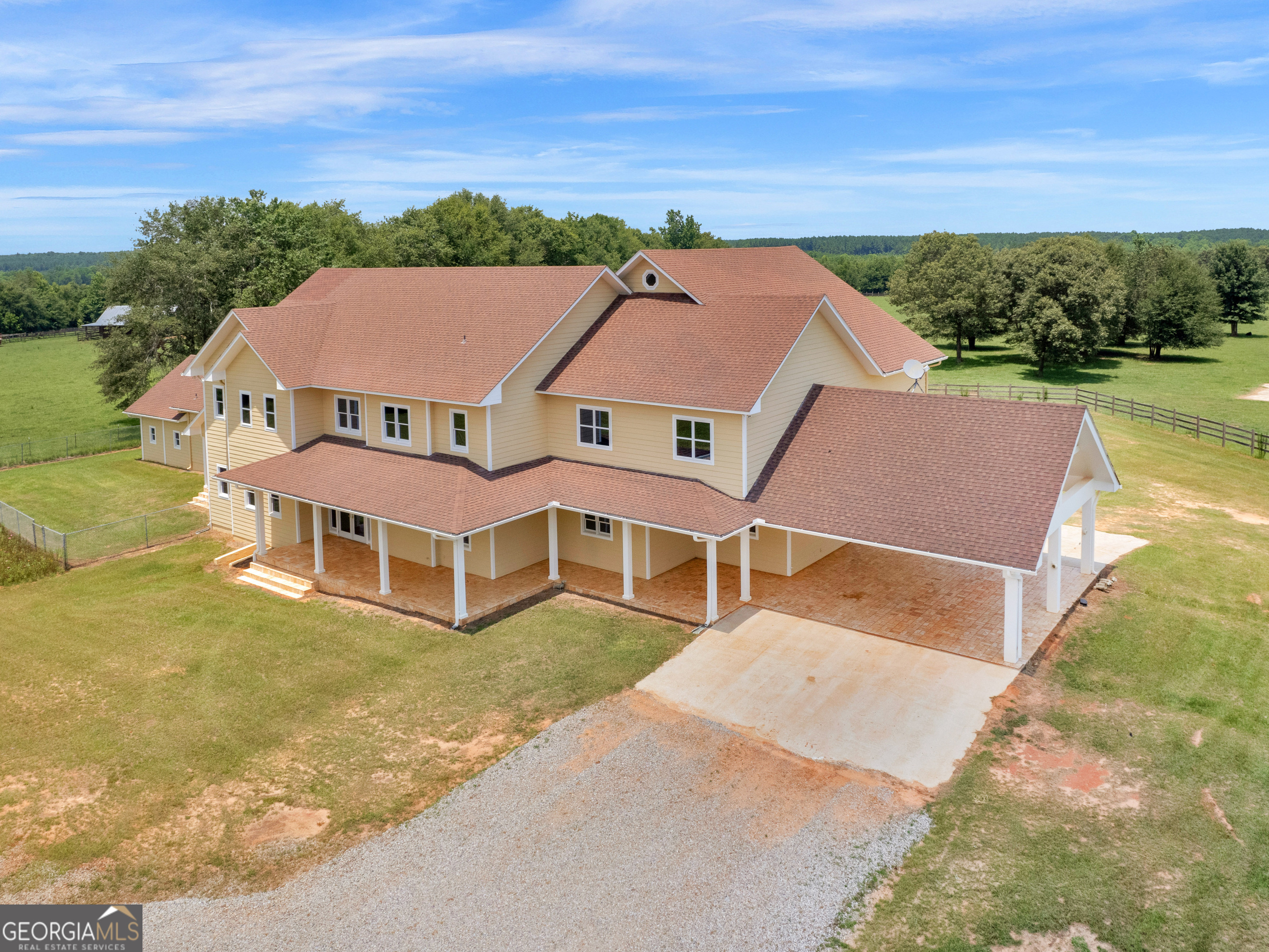 2051 Gough Road Louisville, GA 30434 - Photo 5 of 95 an aerial view of a house with a yard lake view and mountain view