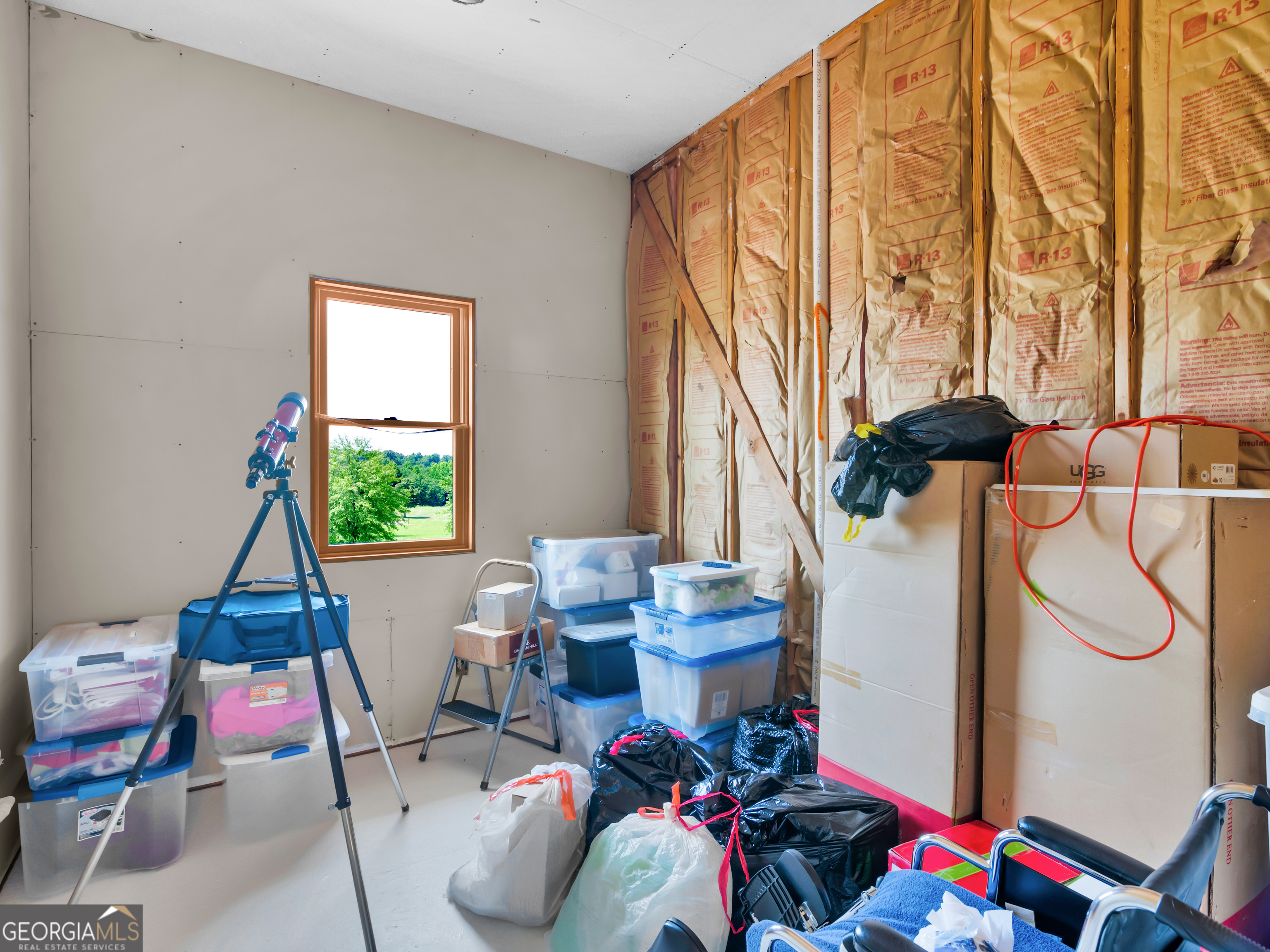 2051 Gough Road Louisville, GA 30434 - Photo 61 of 95 a room with furniture and a window