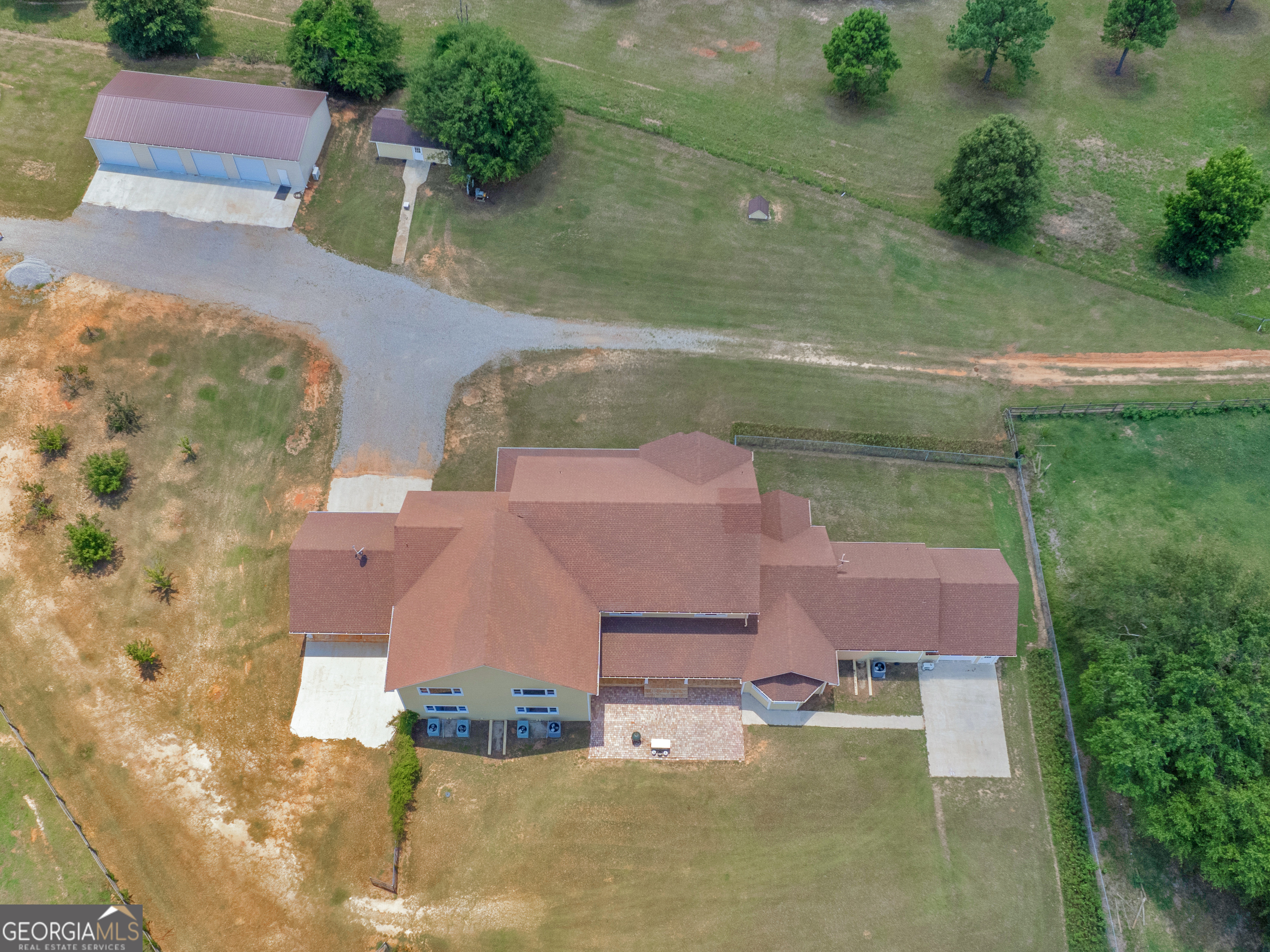 2051 Gough Road Louisville, GA 30434 - Photo 82 of 95 an aerial view of residential houses with outdoor space and street view