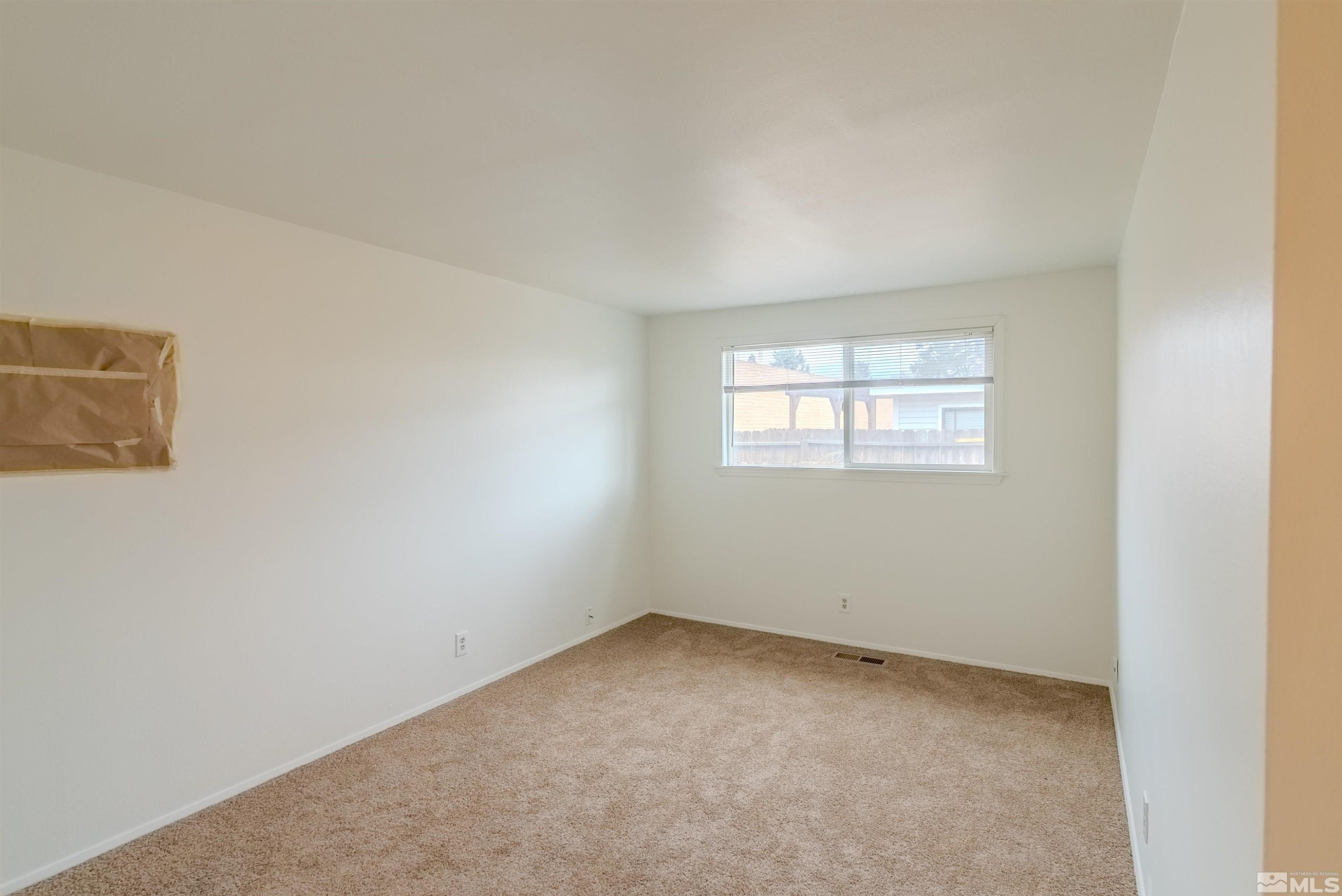 1640 Gault Way Sparks, NV 89431 - Photo 10 of 15 an empty room with windows