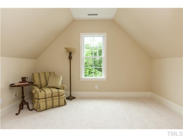 913 Keith Road Wake Forest, NC 27587 - Photo 16 of 25 The Is The Grand Master Suite Retreat. It Could Be Your Own Private Space To Read and Watch Tv, Your Workout Area, Your Office, A Nursery Or A Third Walk-in Fantasy Closet. This Space Has Endless Potential And Is Waiting For You.