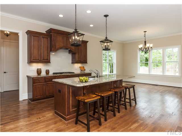 913 Keith Road Wake Forest, NC 27587 - Photo 10 of 25 This Kitchen Can Serve All Your Friends And Family. Spacious Breakfast Room And Island Seating. Wait Till You See The Custom Details Of The Pantry.