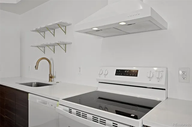 a kitchen with a stove and a kitchen