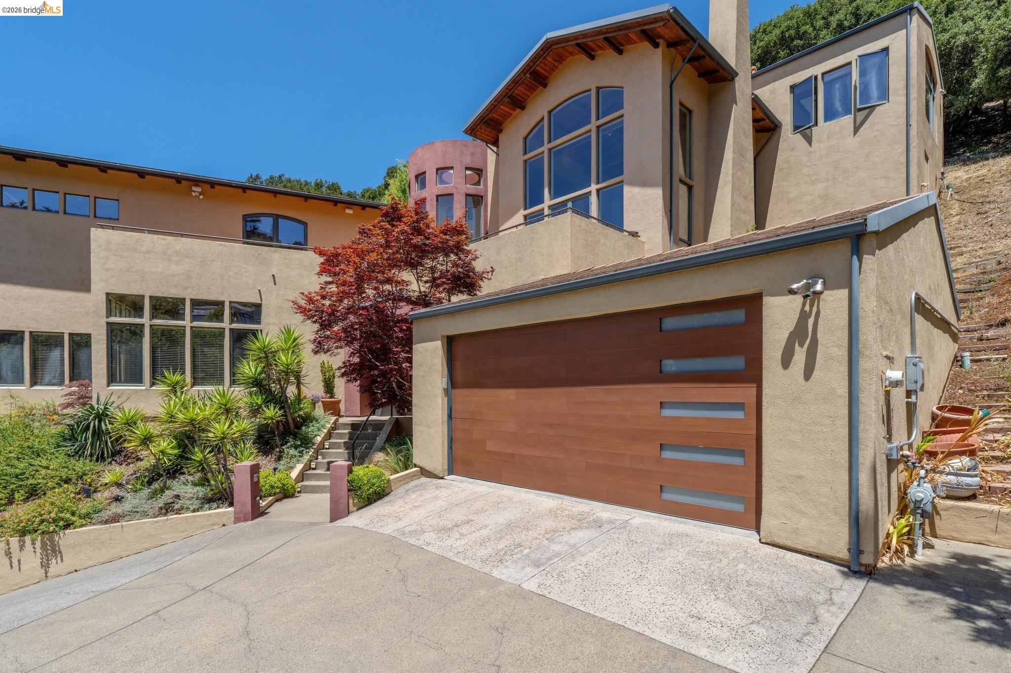 150 Vicente Road Berkeley, CA 94705 - Photo 2 of 54 a front view of a house with a yard