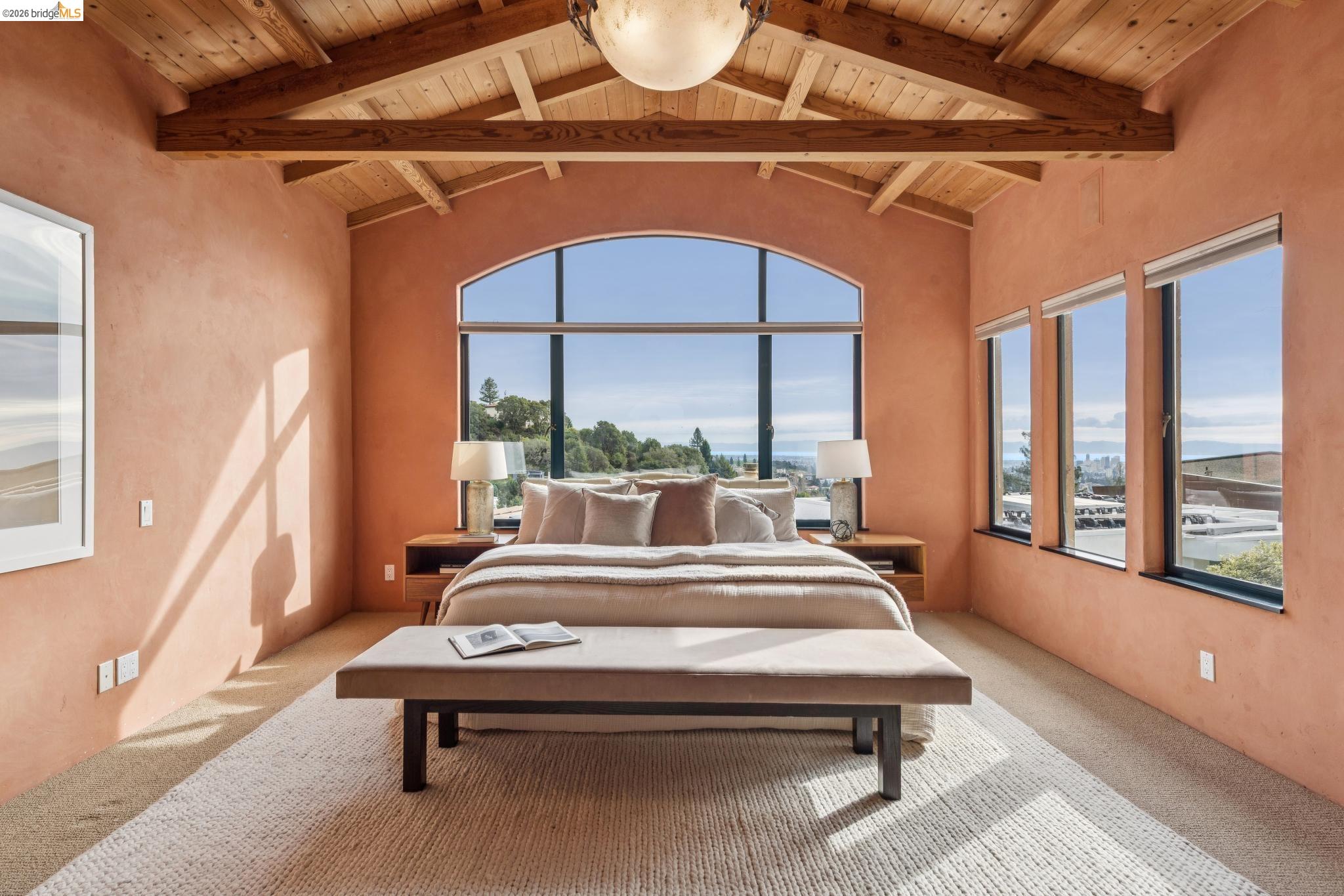 150 Vicente Road Berkeley, CA 94705 - Photo 29 of 54 a bedroom with furniture and a large window