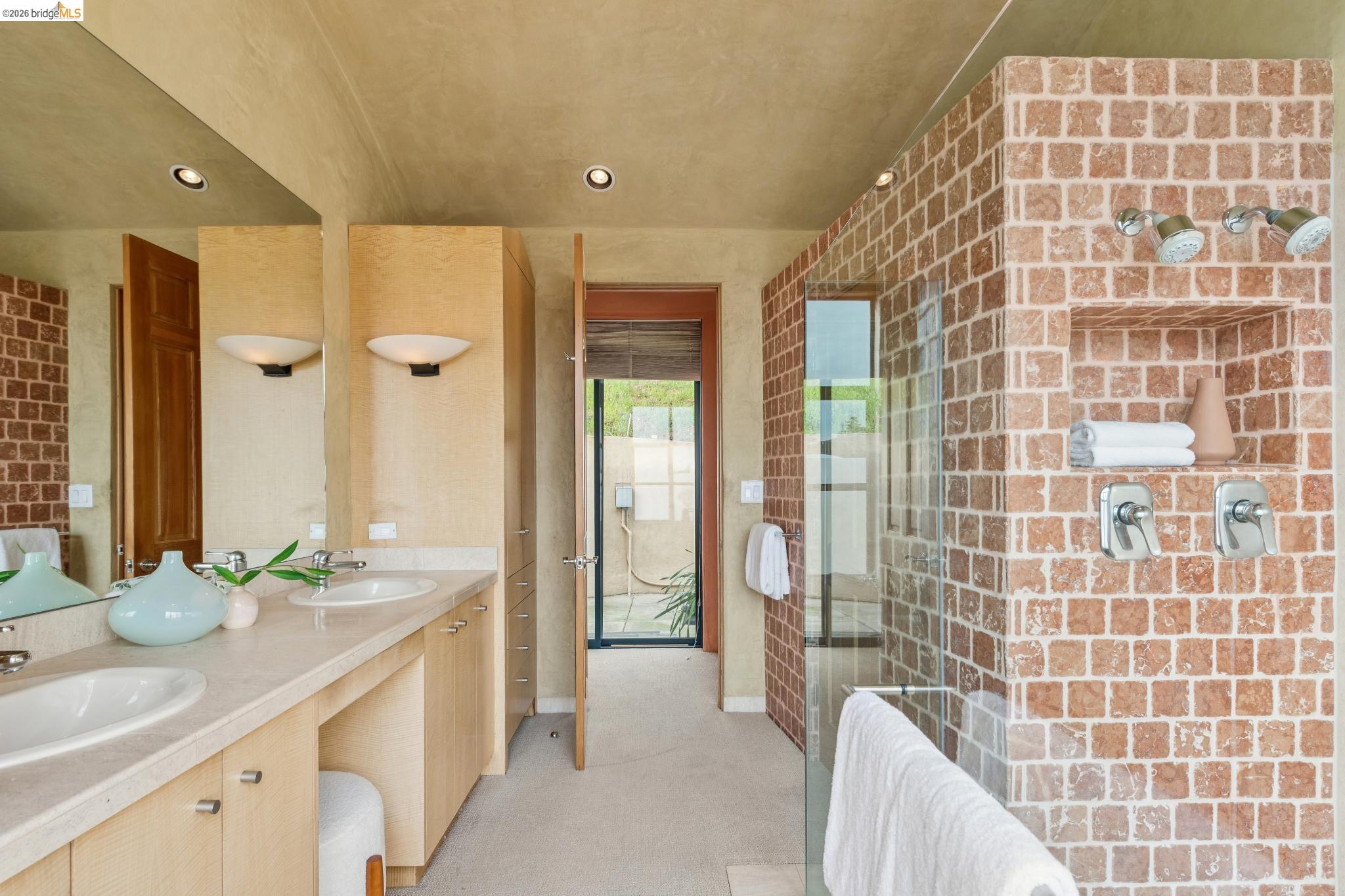 150 Vicente Road Berkeley, CA 94705 - Photo 33 of 54 a spacious bathroom with a double vanity sink a mirror and a shower