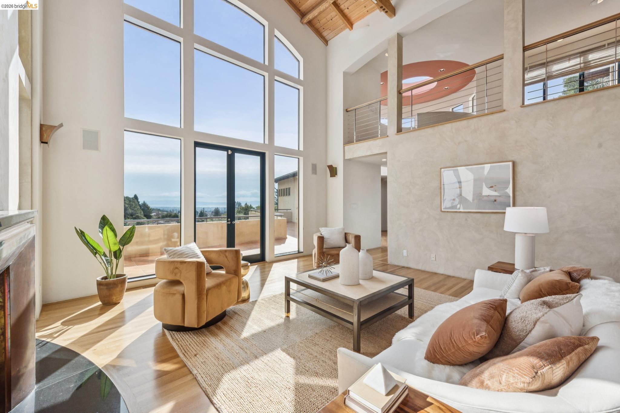 150 Vicente Road Berkeley, CA 94705 - Photo 7 of 54 a living room with furniture and a large window