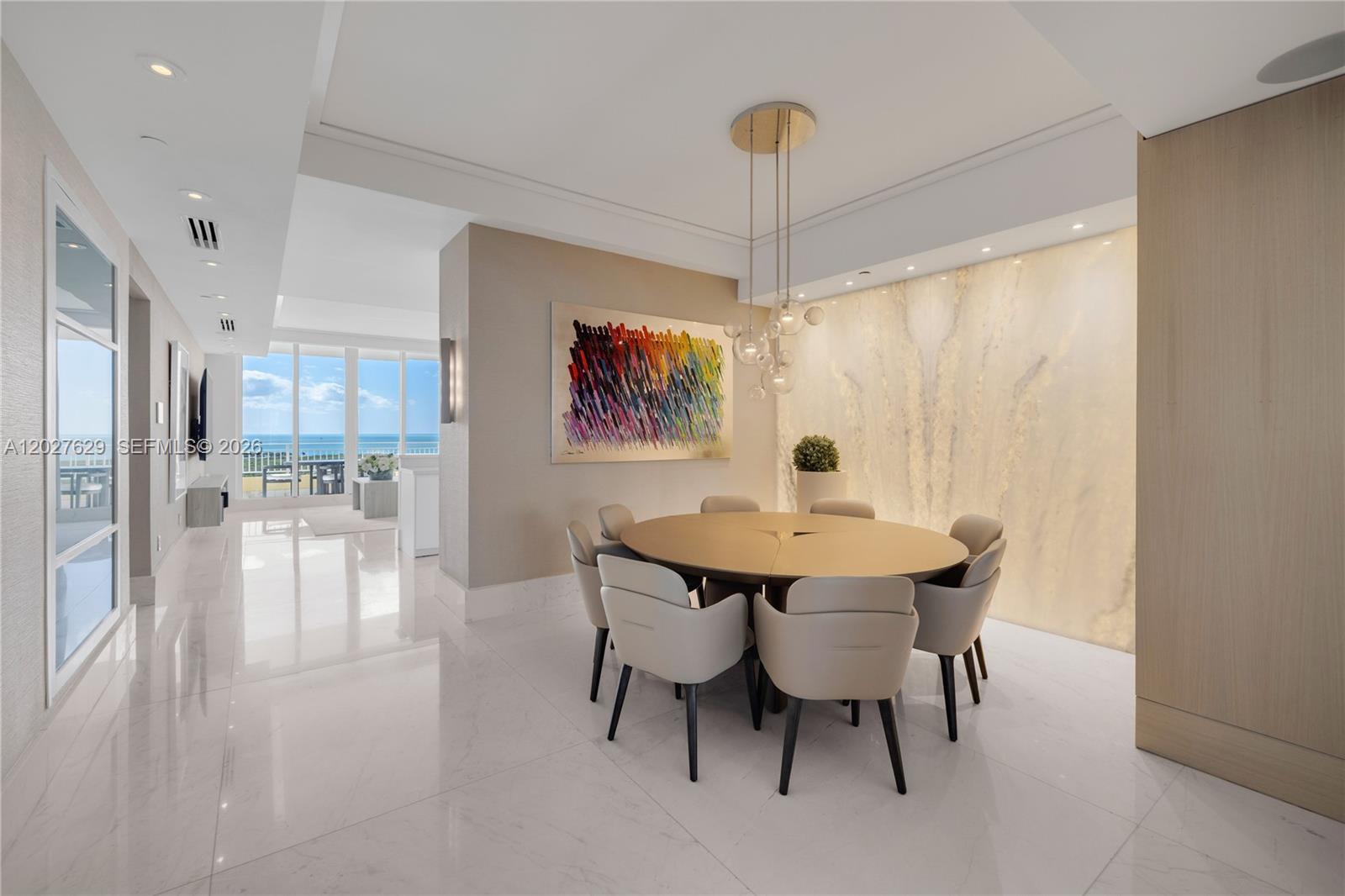 799 Crandon Boulevard, Unit PH8 Key Biscayne, FL 33149 - Photo 7 of 47 a view of a dining room with furniture window and wooden floor