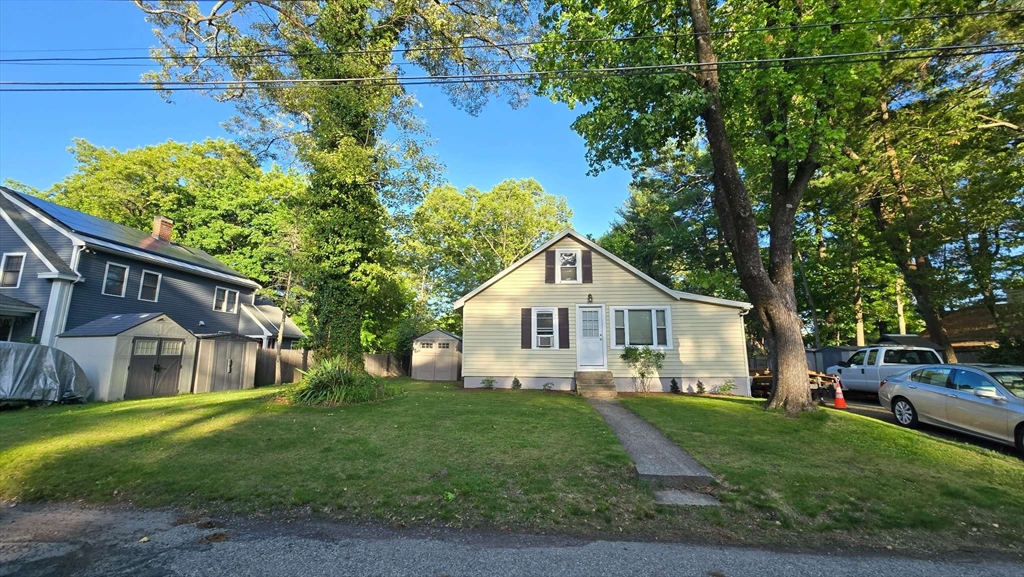32 Birch Road Natick, MA 01760 - Photo 5 of 38 a view of a yard in front of house