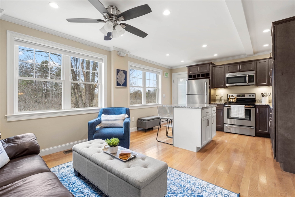 48 Boston Road, Unit A Groton, MA 01450 - Photo 5 of 22 a living room with furniture and a window