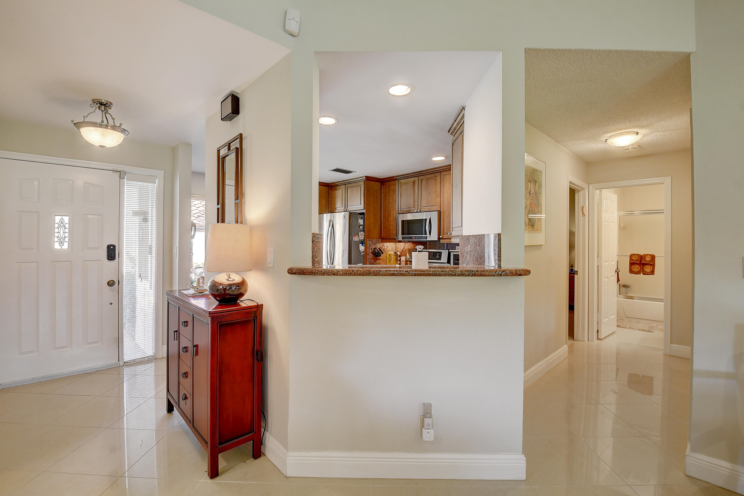 7900 Granada Place, Unit 1103 Boca Raton, FL 33433 - Photo 16 of 56 Kitchen pass through