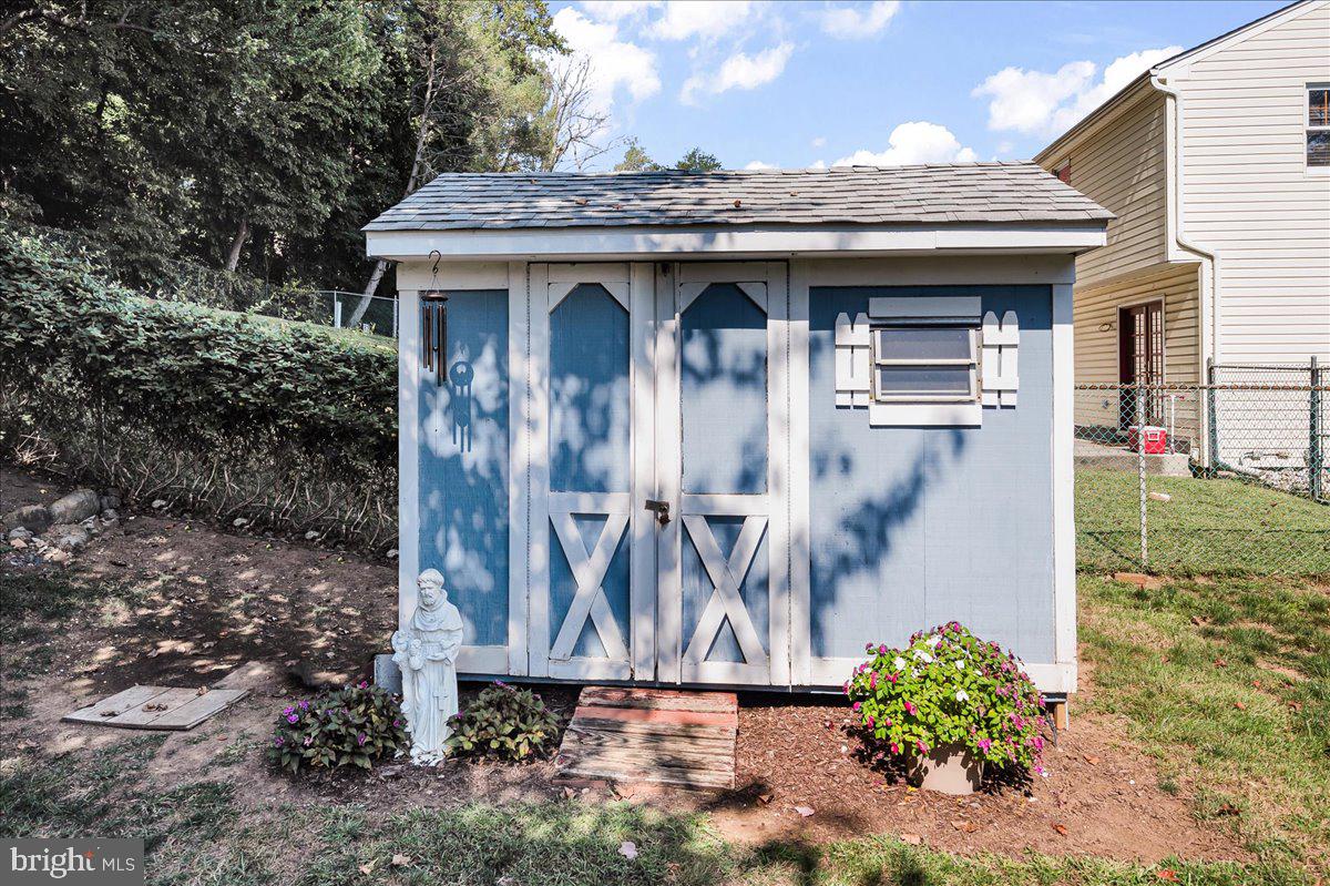 2575 West Colonial Drive Upper Chichester, PA 19061 - Photo 33 of 42 a front view of a house with garden