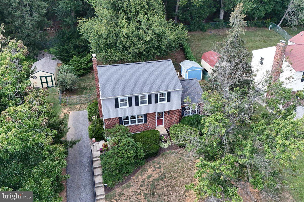 2575 West Colonial Drive Upper Chichester, PA 19061 - Photo 35 of 42 an aerial view of a house with pool and a yard