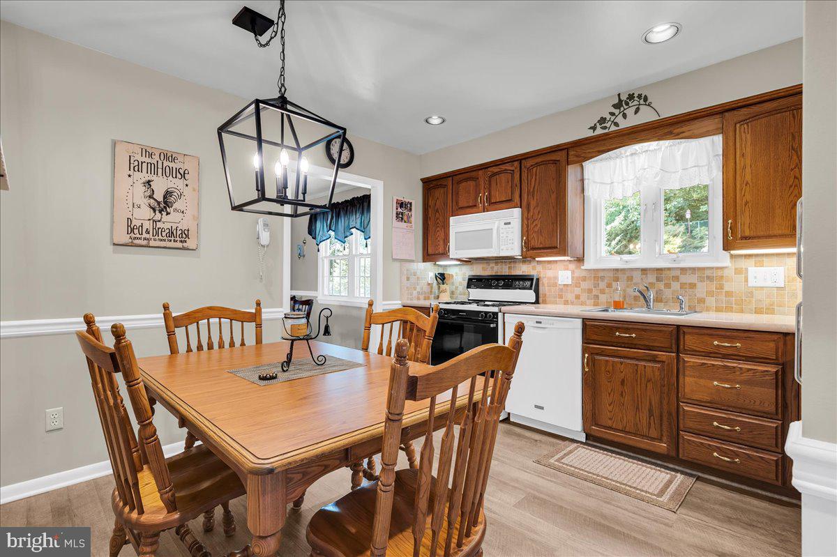 2575 West Colonial Drive Upper Chichester, PA 19061 - Photo 7 of 42 a view of a dining room with furniture window and outside view