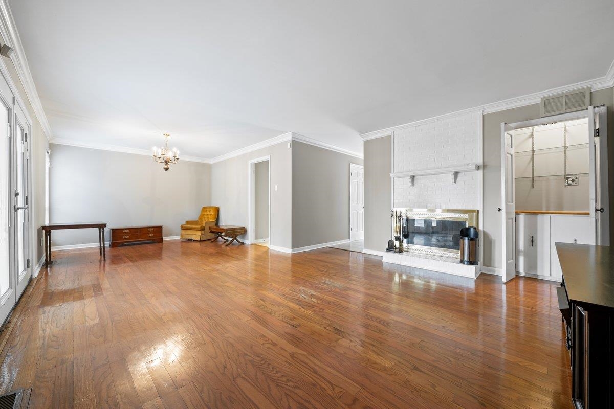 6942 Amberly Road, Unit 6942 Memphis, TN 38119 - Photo 11 of 23 a view of a living room filled with furniture