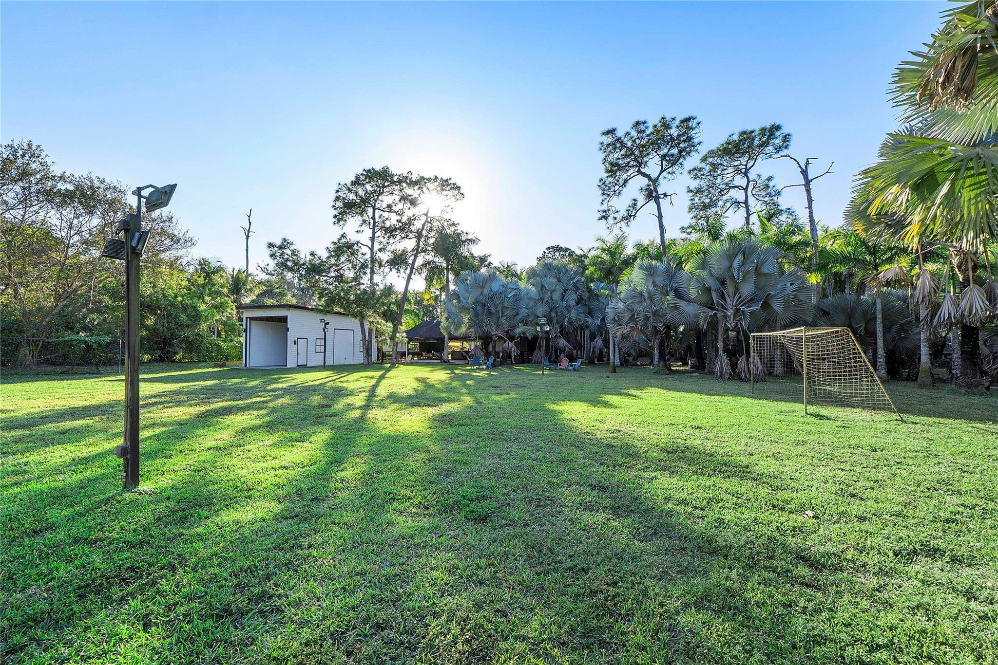 5351 Godfrey Road Parkland, FL 33067 - Photo 2 of 95 a view of a back yard