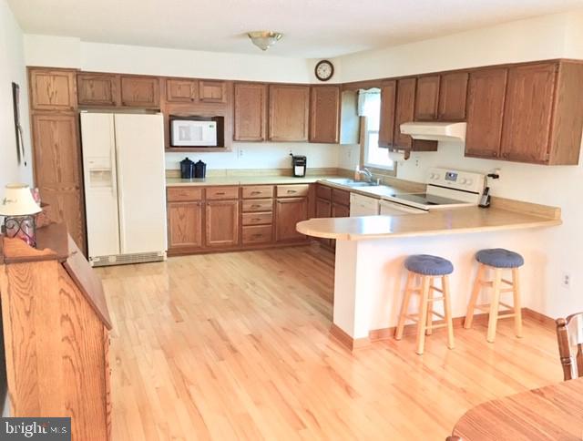 2431 Cool Spring Road Bel Air, MD 21015 - Photo 9 of 35 BRIGHT SPACIOUS KIT W/HARDWD FLRS & BREAKFAST BAR
