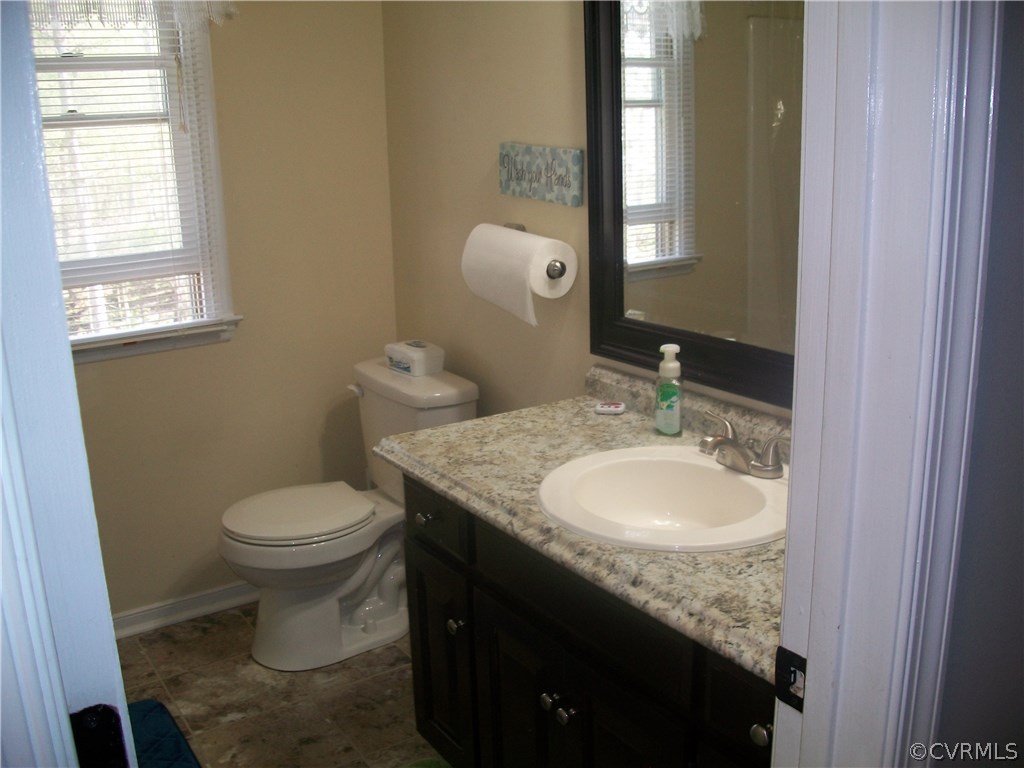 4700 Cedar Cliff Road Chester, VA 23831 - Photo 13 of 20 The upstairs main bathroom.