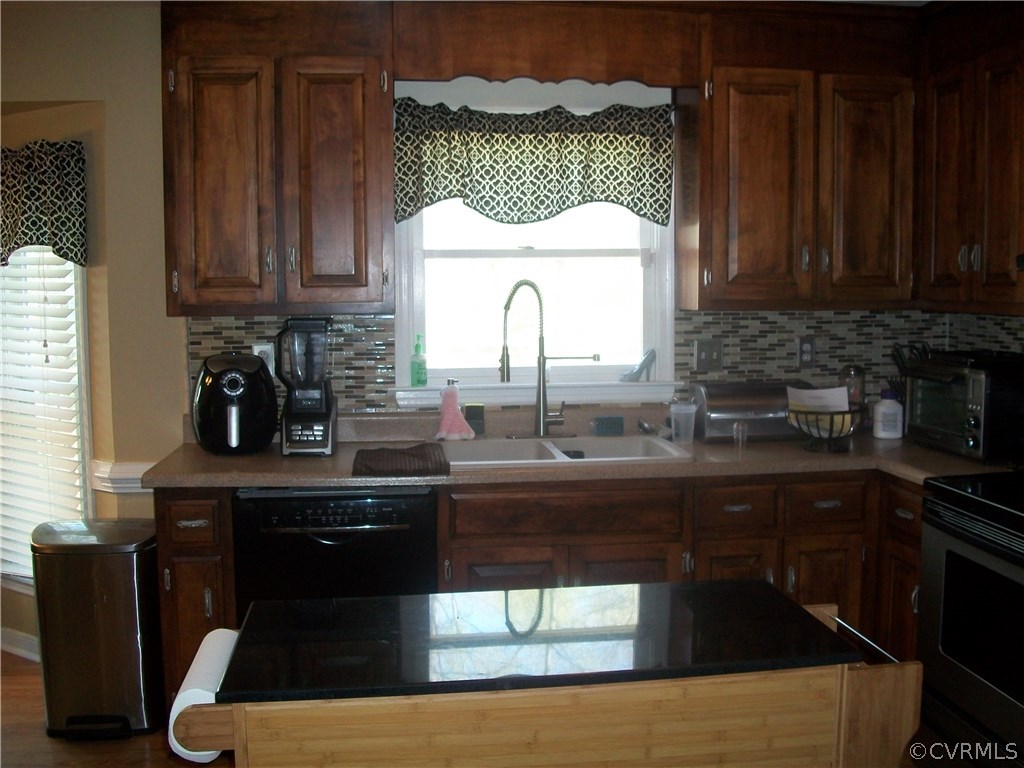 4700 Cedar Cliff Road Chester, VA 23831 - Photo 6 of 20 Another view of the kitchen. Deep double sinks for