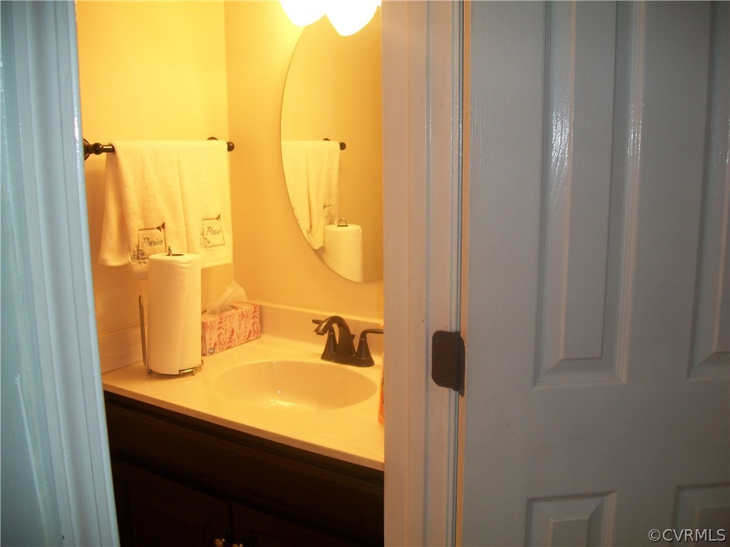 4700 Cedar Cliff Road Chester, VA 23831 - Photo 7 of 20 The downstairs powder room.