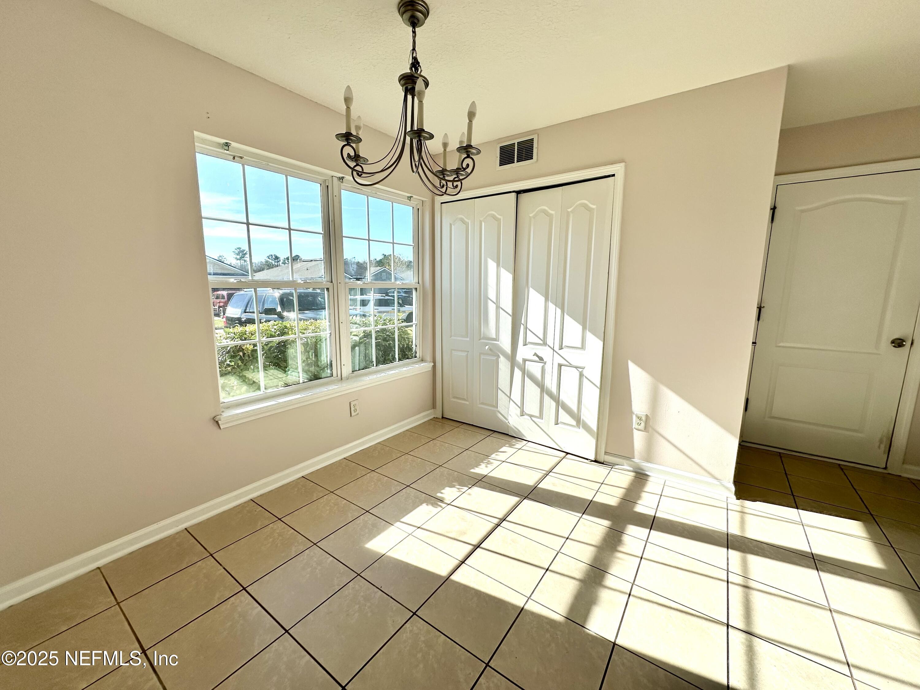 45575 Ingleham Circle Callahan, FL 32011 - Photo 5 of 24 a view of entryway with wooden floor