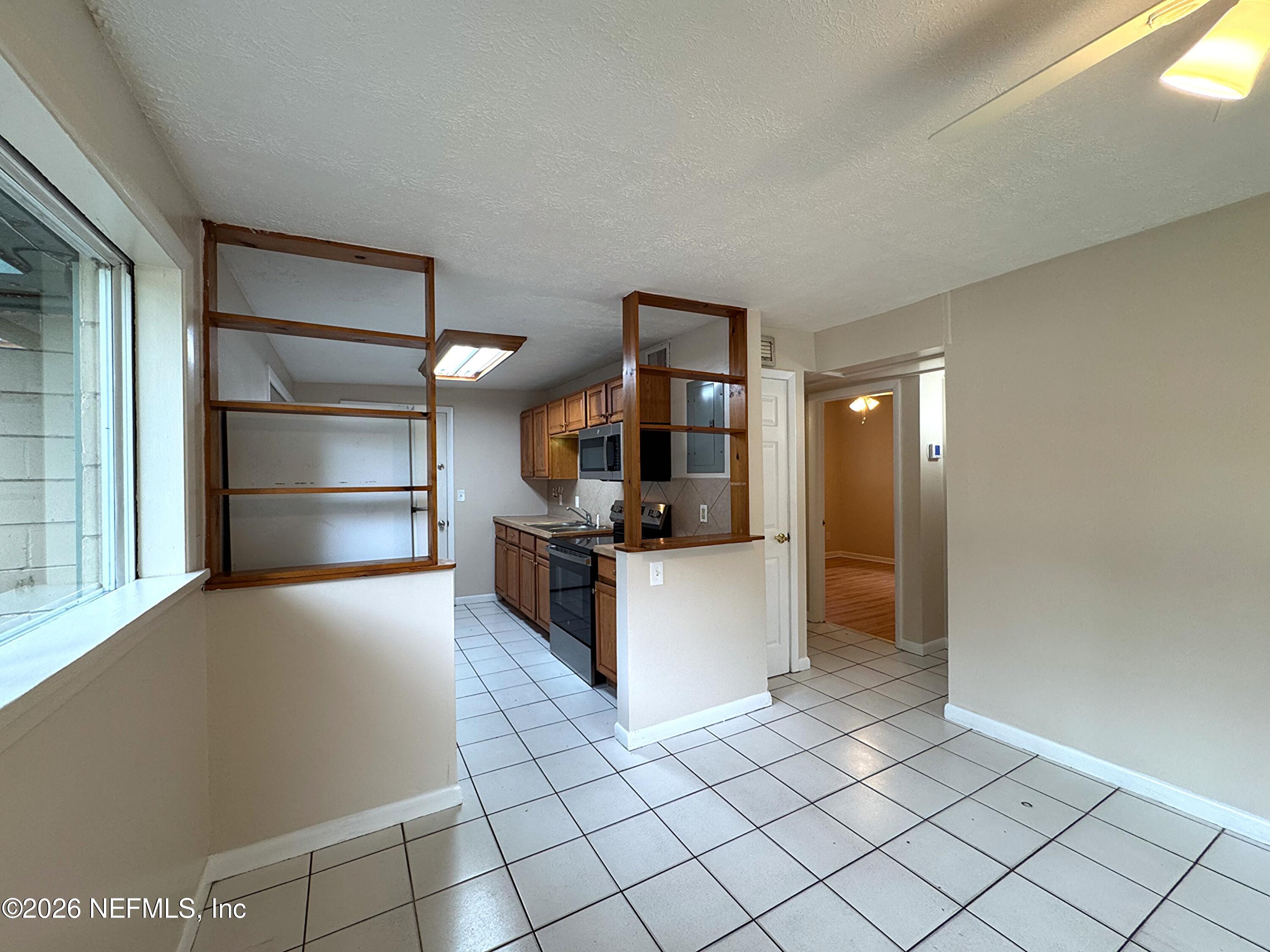 4464 Spring Glen Road, Unit 4464 Jacksonville, FL 32207 - Photo 4 of 15 IMG_2940