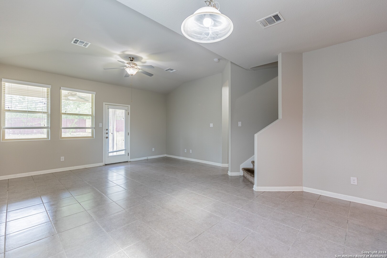 8527 Rolling Tree Converse, TX 78109 - Photo 15 of 40 an empty room with windows and fan