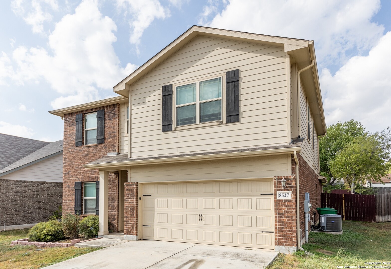 8527 Rolling Tree Converse, TX 78109 - Photo 2 of 40 a front view of a house with garden