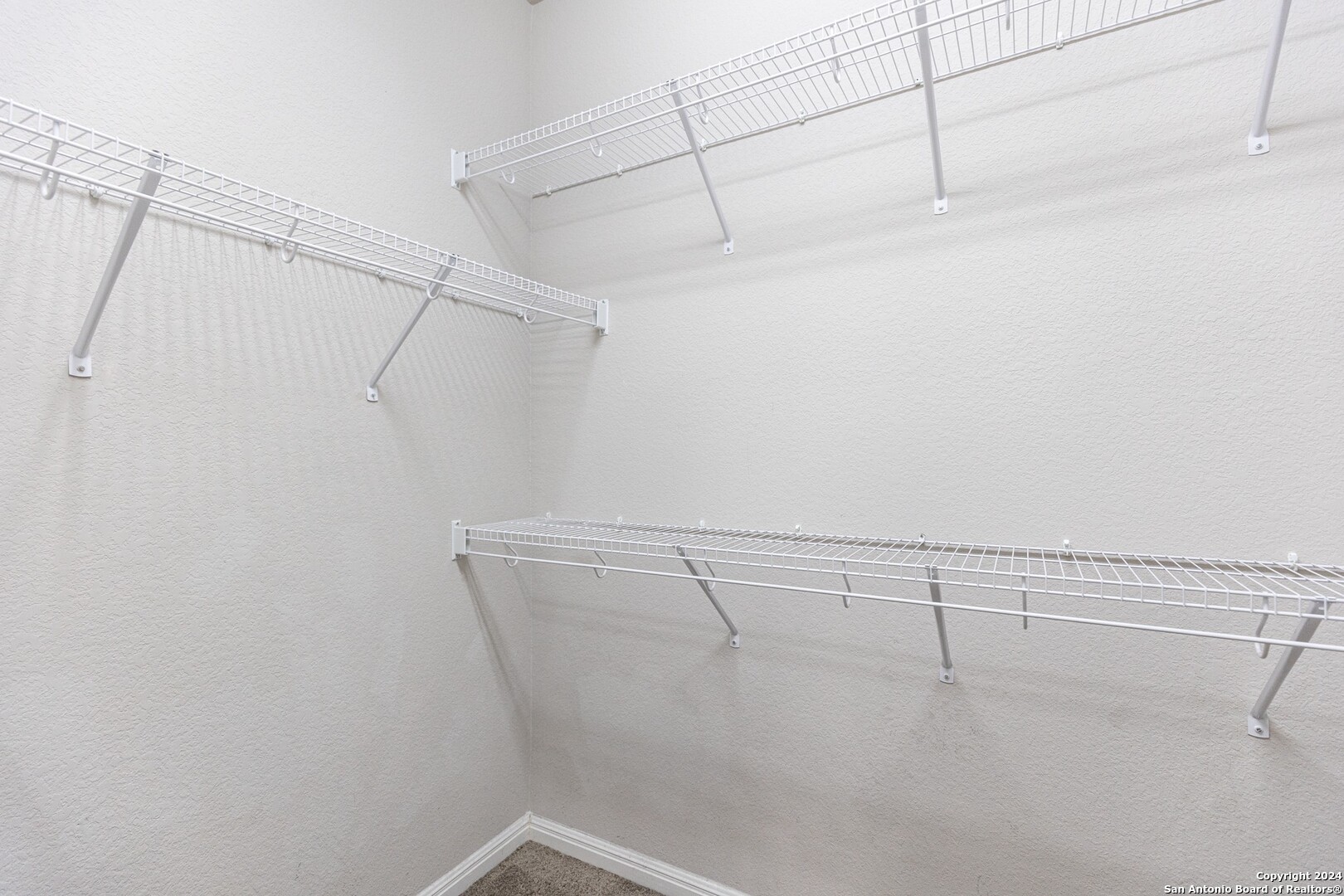 8527 Rolling Tree Converse, TX 78109 - Photo 21 of 40 a view of a room with racks on the wall