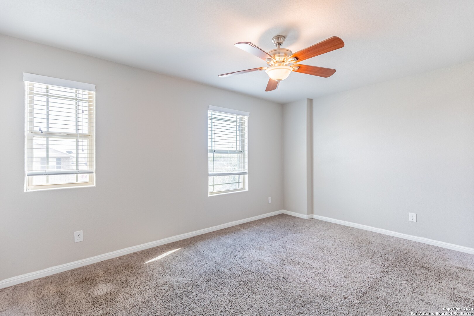 8527 Rolling Tree Converse, TX 78109 - Photo 26 of 40 a view of a livingroom with a ceiling fan and window