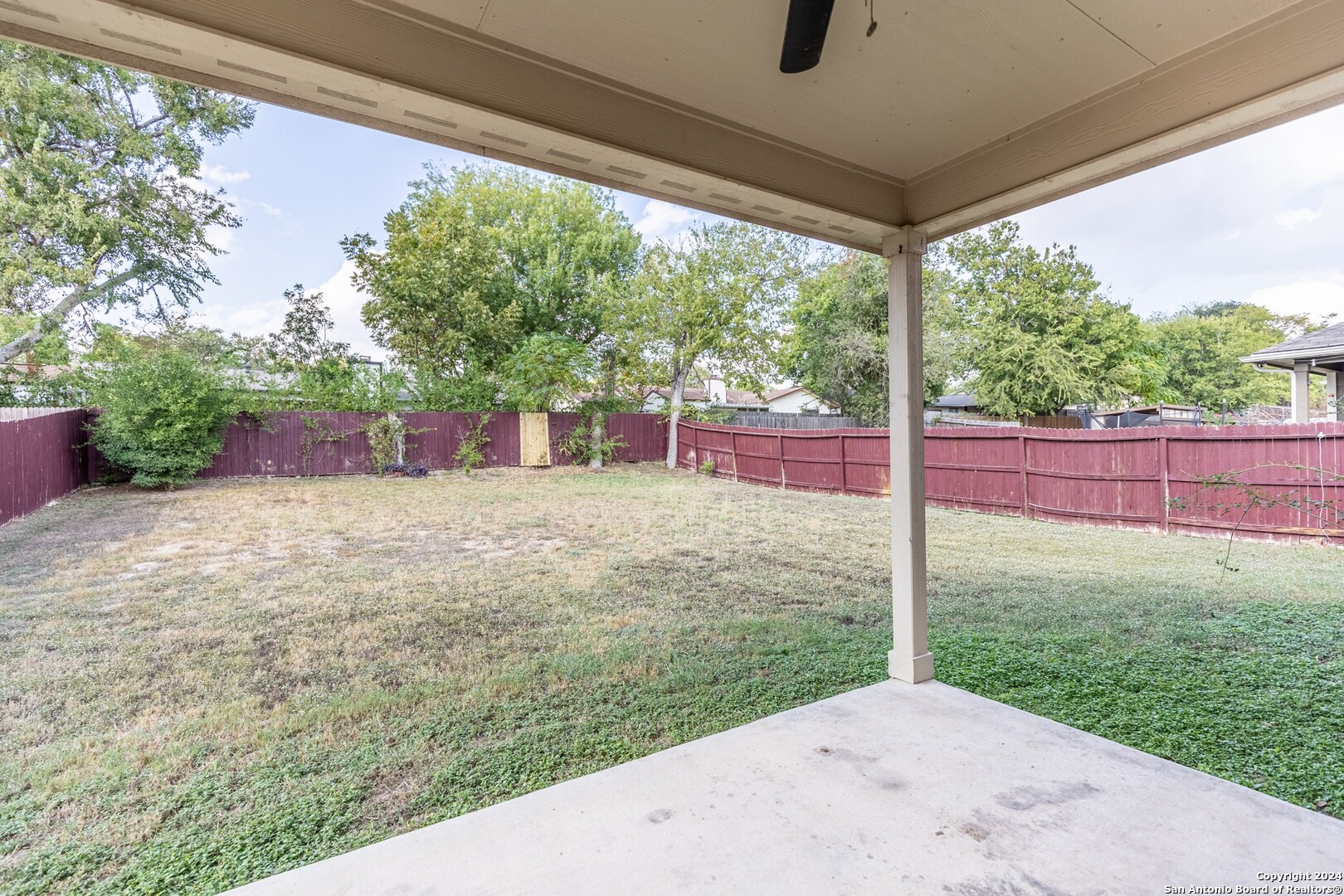 8527 Rolling Tree Converse, TX 78109 - Photo 35 of 40 a view of a backyard with a garden