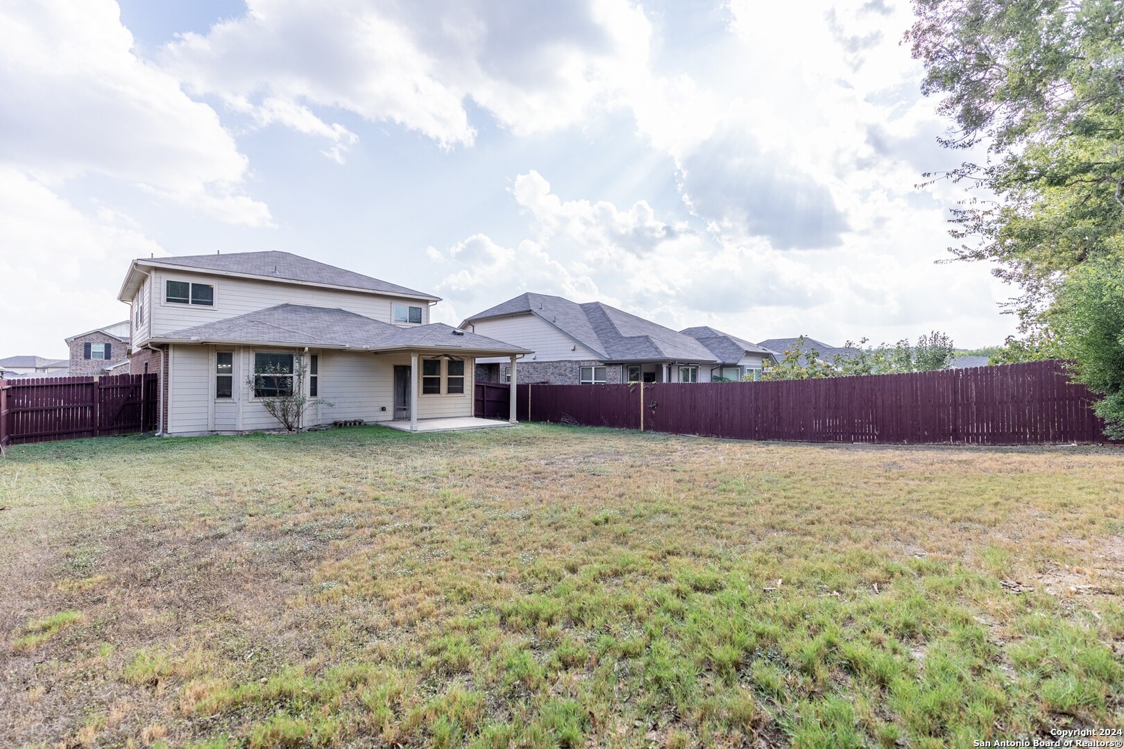 8527 Rolling Tree Converse, TX 78109 - Photo 37 of 40 a backyard of a house with table and chairs