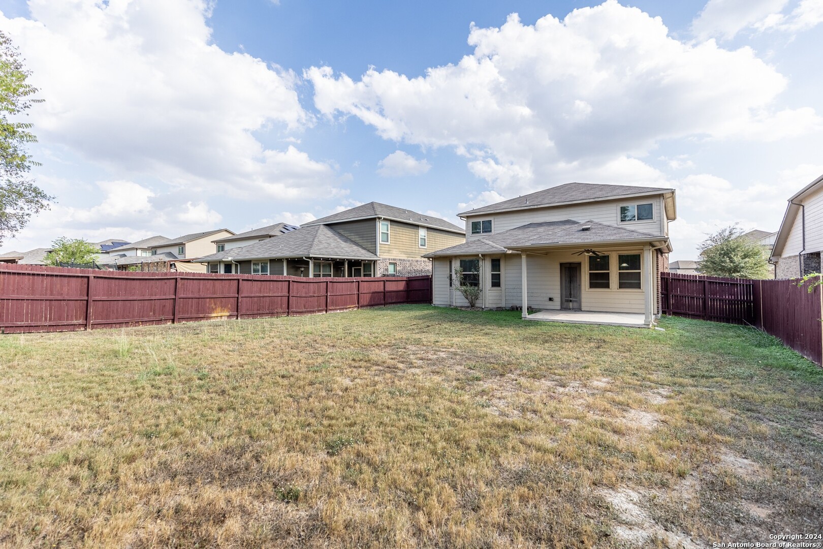 8527 Rolling Tree Converse, TX 78109 - Photo 38 of 40 a view of a house with backyard and porch