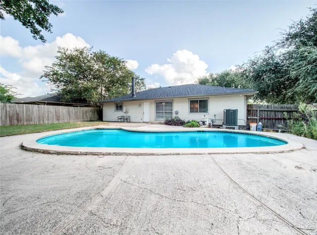 a view of house with outdoor space