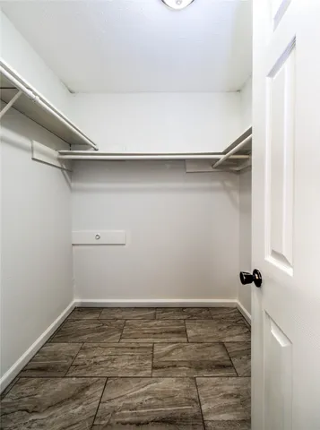 a view of an empty walk in closet