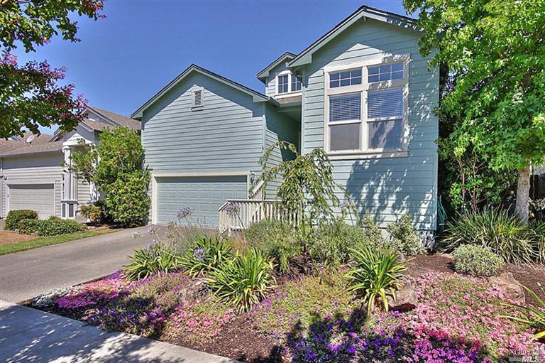 5665 Raters Drive Santa Rosa, CA 95409 - Photo 1 of 1 a front view of a house with a yard and garage