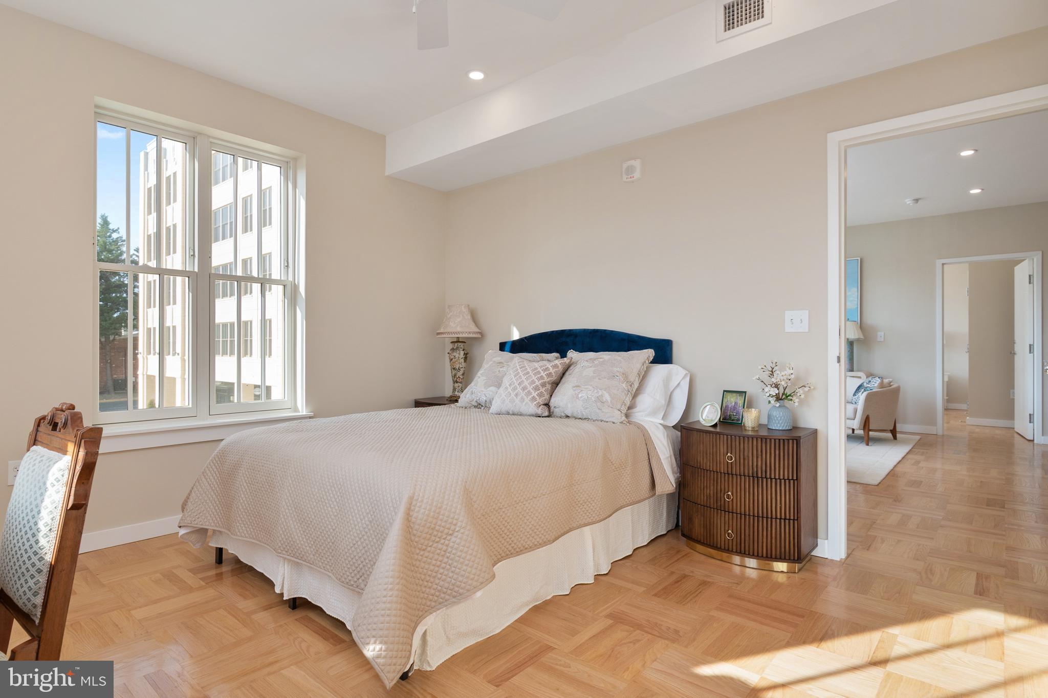 10339 Old Georgetown Road, Unit 516 Bethesda, MD 20814 - Photo 22 of 44 a bedroom with a bed and window