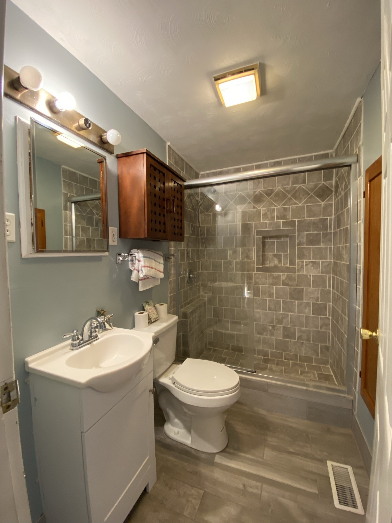 1666 Rock Products Road Columbia, TN 38401 - Photo 15 of 22 a bathroom with a sink mirror toilet and shower