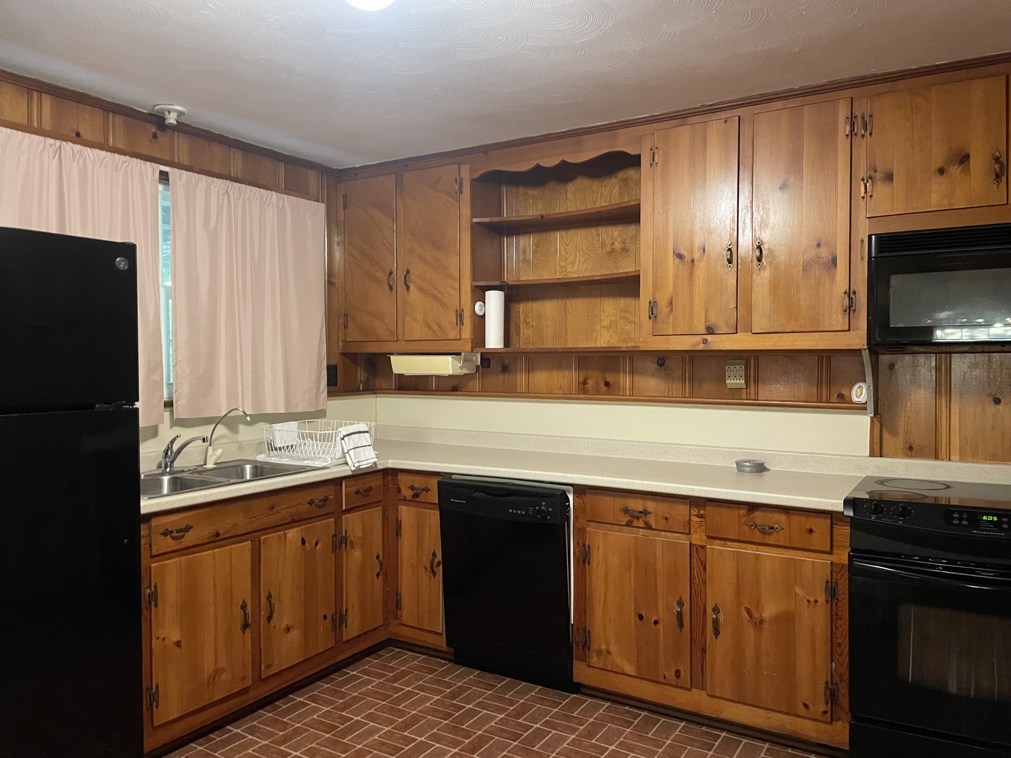 1666 Rock Products Road Columbia, TN 38401 - Photo 8 of 22 a kitchen with a sink stove and cabinets