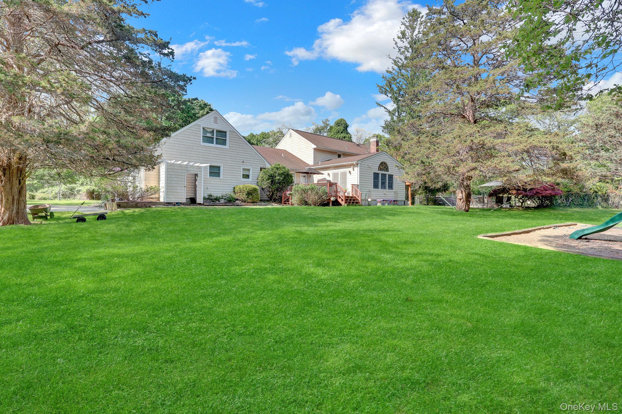 15 Stillwater Road Nissequogue, NY 11780 - Photo 36 of 43 Expansive green lawn providing ample outdoor space