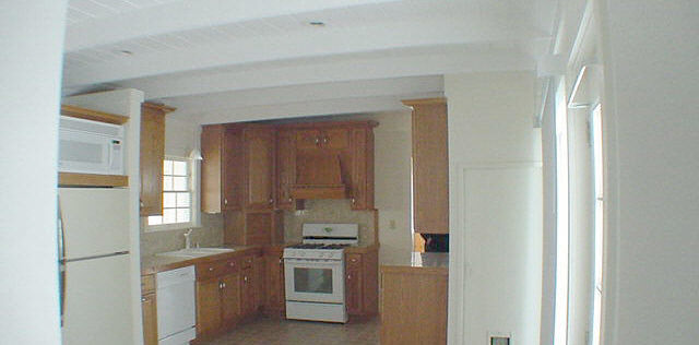 9432 East Scott Road Stillman Valley, IL 61084 - Photo 2 of 6 a kitchen with cabinets and stainless steel appliances