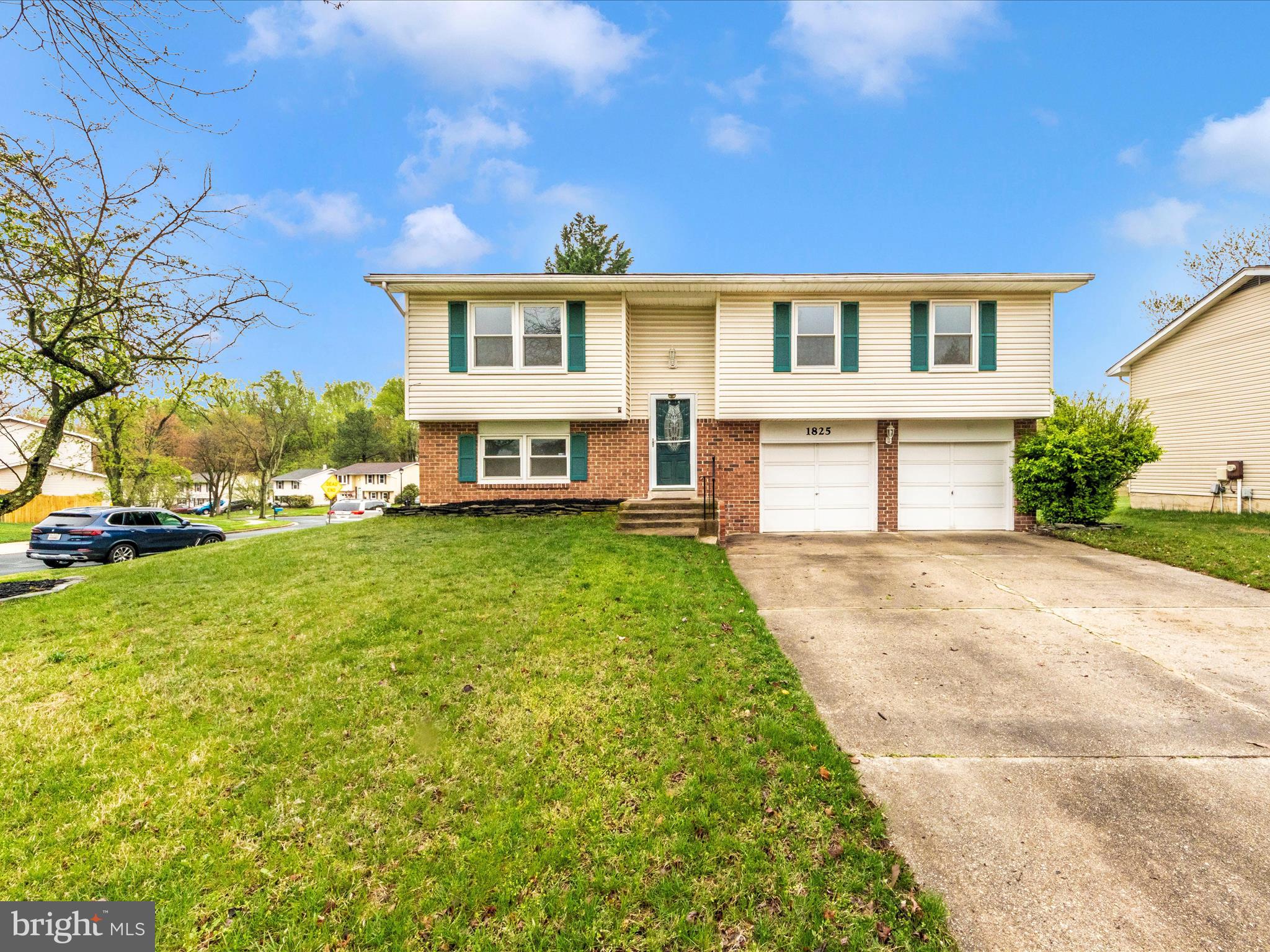 1825 Montreal Road Severn, MD 21144 - Photo 1 of 51 front view of a house with a yard