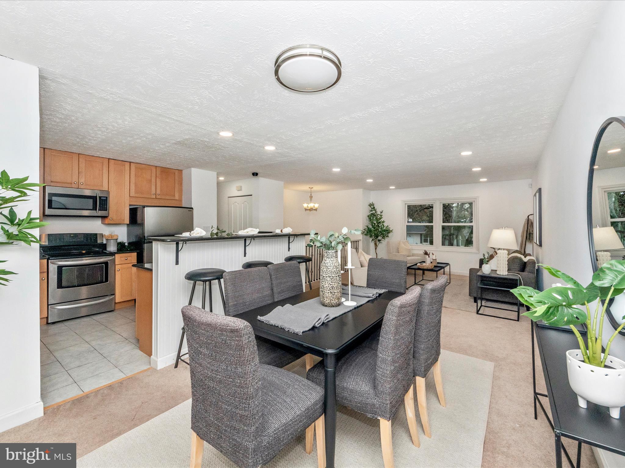 1825 Montreal Road Severn, MD 21144 - Photo 12 of 51 a view of kitchen with dining table and chairs