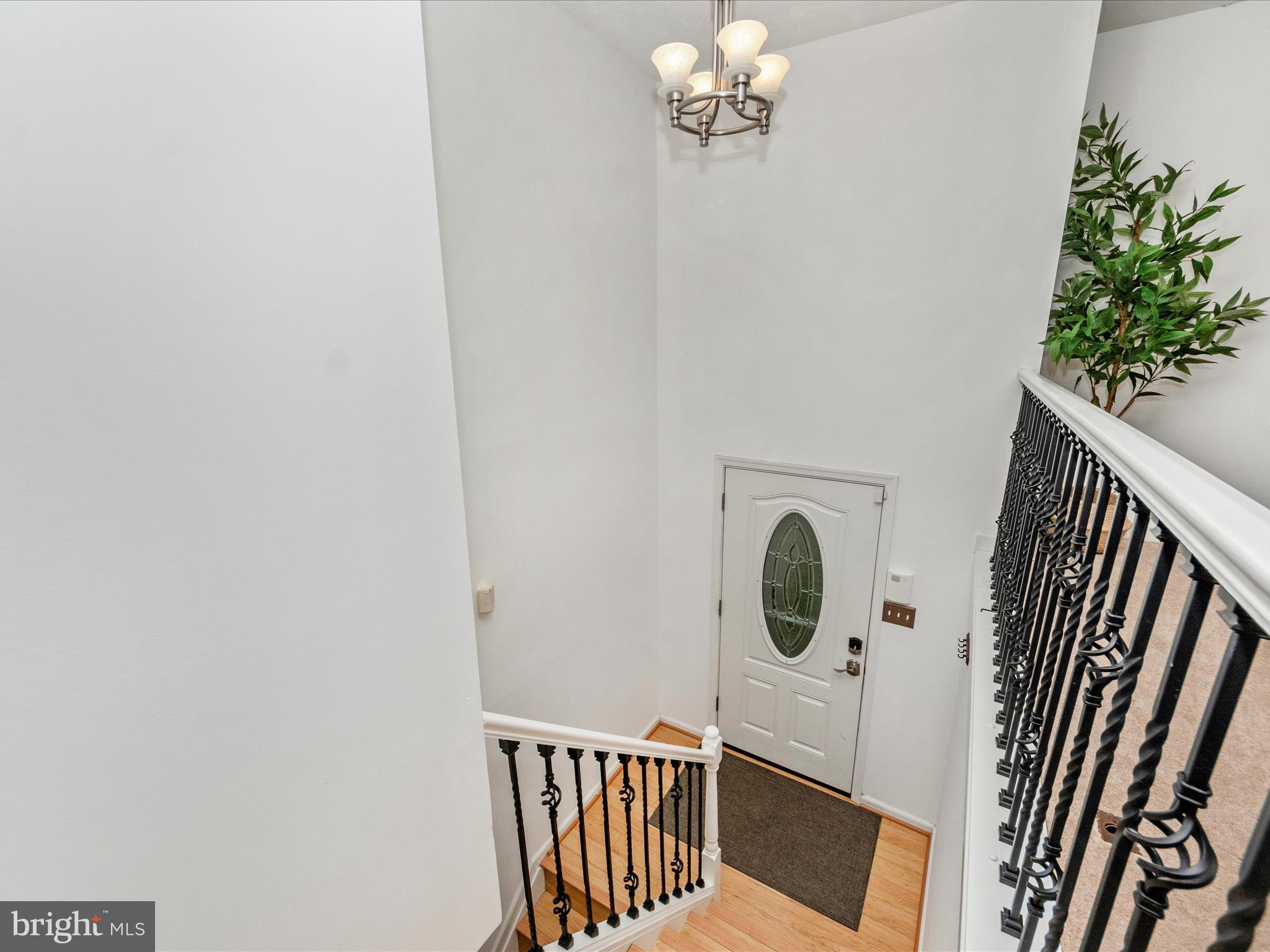 1825 Montreal Road Severn, MD 21144 - Photo 2 of 51 a view of a door and wooden floor