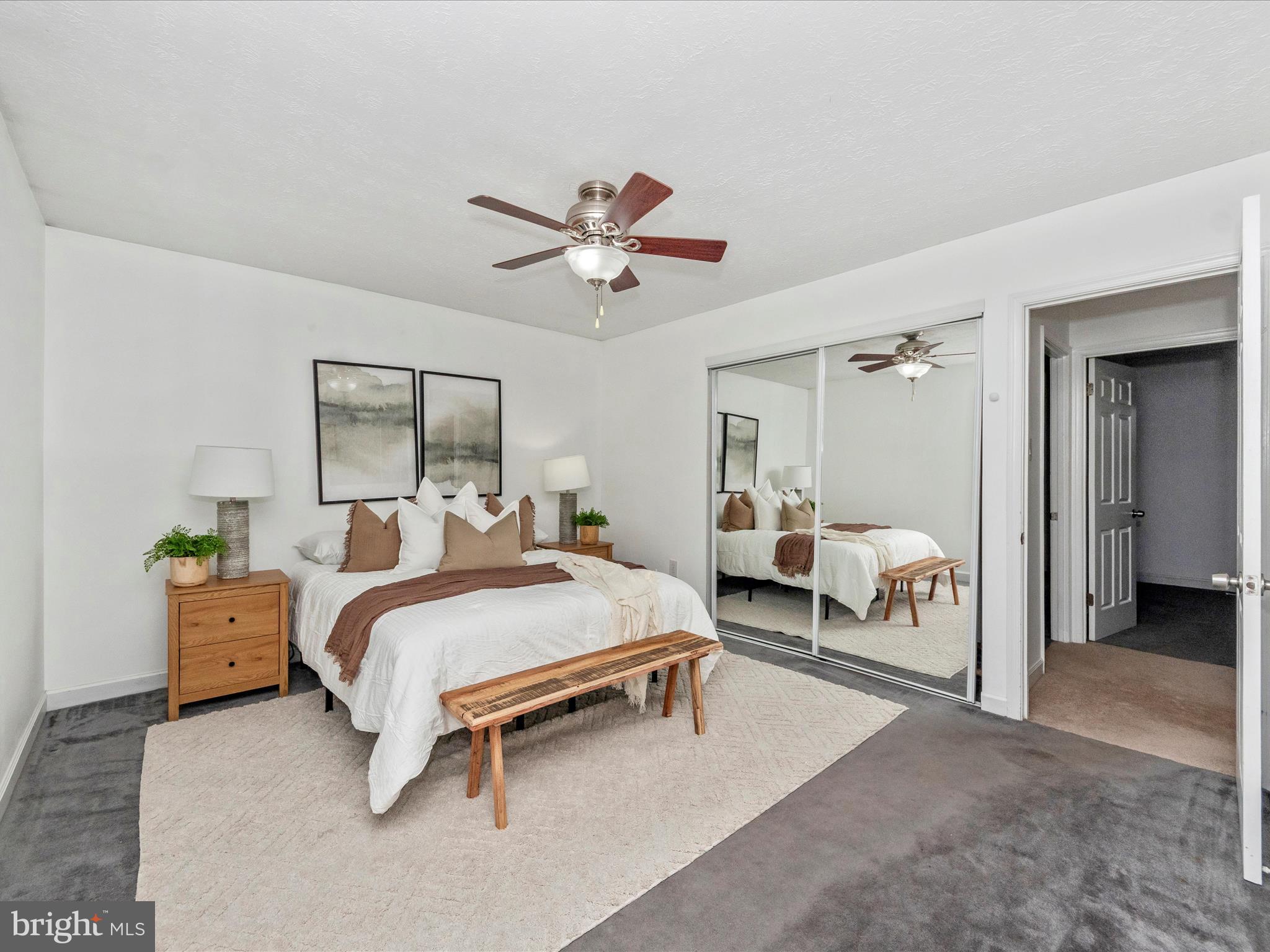 1825 Montreal Road Severn, MD 21144 - Photo 23 of 51 a bedroom with a bed and a chandelier