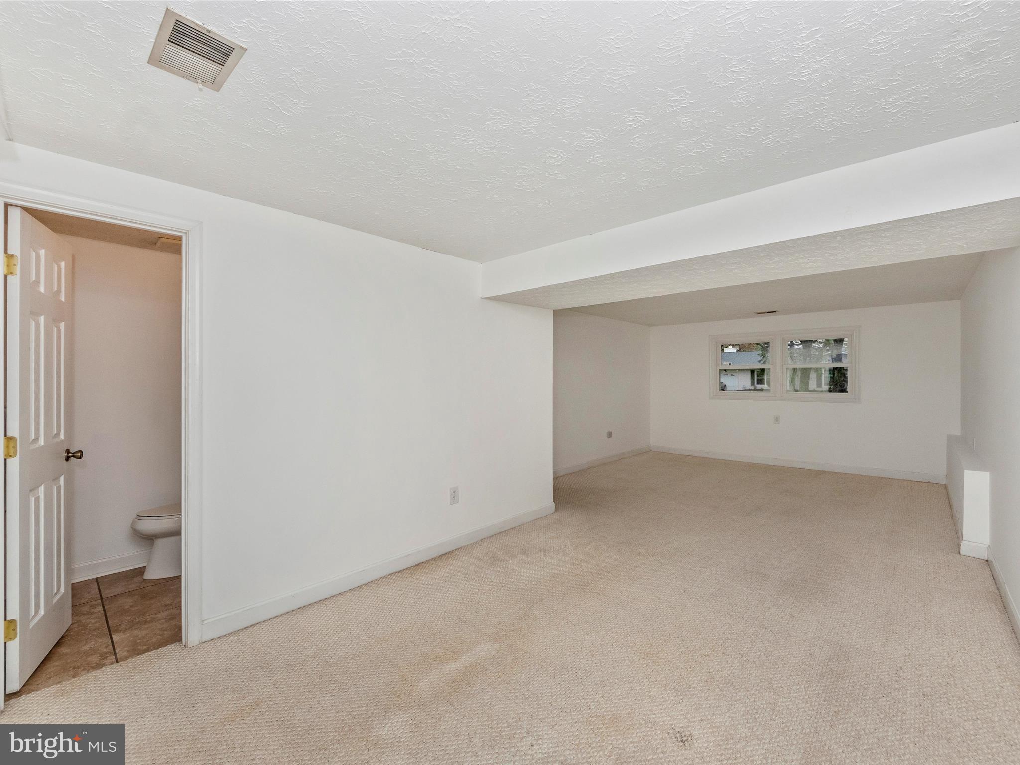 1825 Montreal Road Severn, MD 21144 - Photo 36 of 51 an empty room with white door